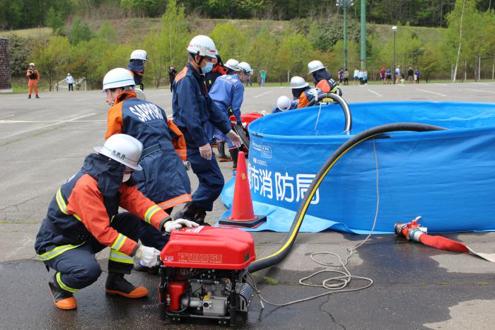 消防団の小型ポンプと10トン水槽